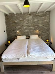 Postel nebo postele na pokoji v ubytování B&B Le Nid d'Hirondelle