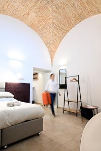 Postel nebo postele na pokoji v ubytování Suitehome B&B con vasca