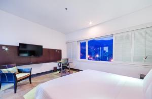 Μια τηλεόραση ή/και κέντρο ψυχαγωγίας στο Hotel Spiwak Chipichape Cali