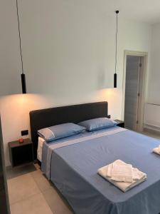 Postel nebo postele na pokoji v ubytování La casa dei Coloni