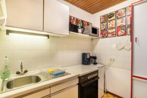 Kuchyň nebo kuchyňský kout v ubytování Aixpress Apartment