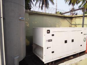 a white electrical box sitting next to a wall at Hotel bougainvillea Victoria island in Lagos