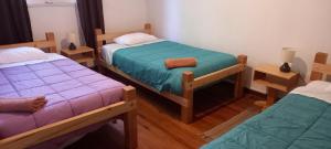 Voodi või voodid majutusasutuse Terrandino Hostel toas