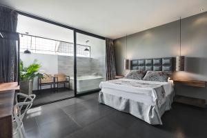 Hotel Cartagena DC客房内的一张或多张床位