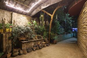 a room with a bunch of plants in it at Ranger - Bandra West in Mumbai