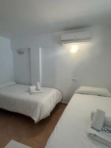 Un ou plusieurs lits dans un hébergement de l'établissement Skol 925A by Completely Marbella