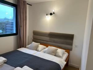 Posteľ alebo postele v izbe v ubytovaní Avila Park & SPA