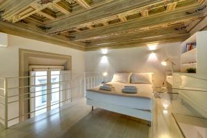 Posteľ alebo postele v izbe v ubytovaní Gold Suite