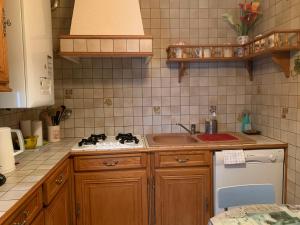 Kuchyň nebo kuchyňský kout v ubytování gite la maison16 + 7 fotografií