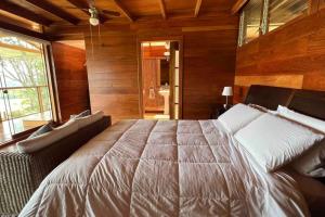 Cama ou camas em um quarto em Vista panorámica de Laguna Azul en Sauce-San Martín