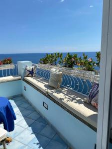 a balcony with a view of the ocean at Palazzo Talamo in Positano