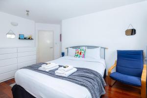 Ein Bett oder Betten in einem Zimmer der Unterkunft Central 1BR, 4min Vauxhall & Oval, 30min Big Ben