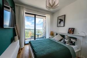 Krevet ili kreveti u jedinici u okviru objekta Aspectus apartmani Divcibare