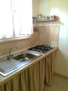 Kuchyň nebo kuchyňský kout v ubytování Corte di Puglia + 17 fotografií