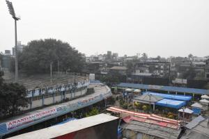 an overhead view of a city with a train station at Kajal's Home stay in Siliguri