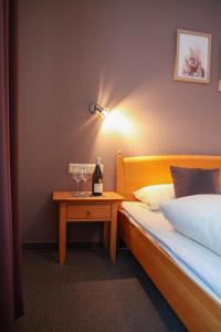 Postel nebo postele na pokoji v ubytování Hotel Kickert