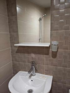 Phòng tắm tại Стаи за гости Калина1