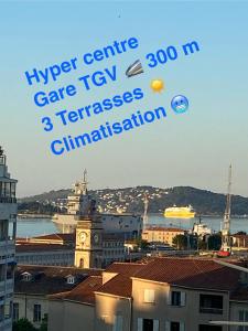 a poster of a city with a clock tower and a building at Les Terrasses in Toulon