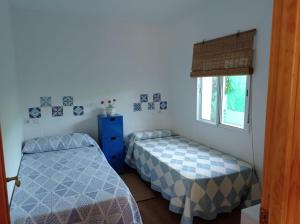 Ένα ή περισσότερα κρεβάτια σε δωμάτιο στο Albanta