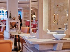 Reštaurácia alebo iné gastronomické zariadenie v ubytovaní Genuss - und Vitalhotel Moisl