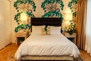 Postel nebo postele na pokoji v ubytování HOTEL ALONSO DE ERCILLA