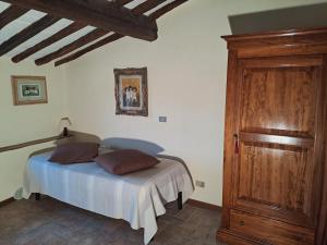 Posteľ alebo postele v izbe v ubytovaní Podere Il Caggio Rooms