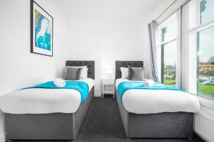 Gulta vai gultas numurā naktsmītnē Harborne 2 Bedroom House - Parking - Smart TV - Wifi - 62W