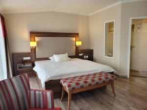 Кровать или кровати в номере Hotel Number One