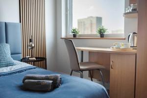 Χώρος καθιστικού στο Sapphire Hotel Room Poznan