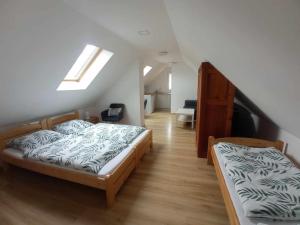 Katil atau katil-katil dalam bilik di Stodoła z widokiem