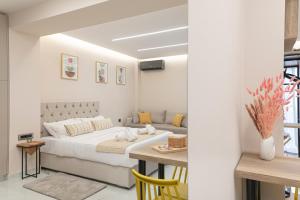 Postel nebo postele na pokoji v ubytování Elite Suite Loutraki
