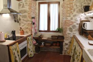 O bucătărie sau chicinetă la Casa Valle del Lozoya