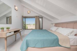 Ένα ή περισσότερα κρεβάτια σε δωμάτιο στο Villa Lefki Sofita
