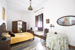Posteľ alebo postele v izbe v ubytovaní La Casa del Cura 1935