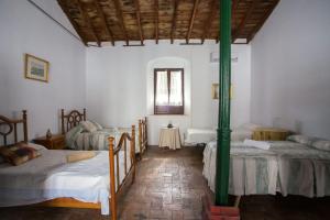 Posteľ alebo postele v izbe v ubytovaní La Casa del Cura 1935