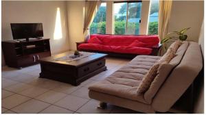Posezení v ubytování Departamento acogedor Hotel-Condominio Buganvillas