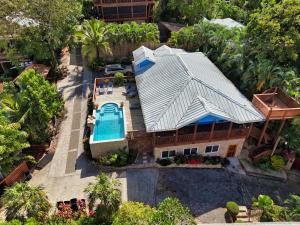an overhead view of a house with a swimming pool at Blue Orchid in Jobs Bight