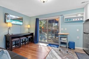 a living room with a desk and a window at West Fairway in Coeur d'Alene