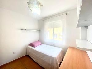 Łóżko lub łóżka w pokoju w obiekcie Casa Cony