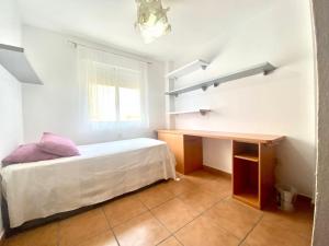 Łóżko lub łóżka w pokoju w obiekcie Casa Cony