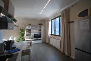Η κουζίνα ή μικρή κουζίνα στο Andrea Olga House