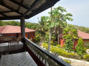 a view from the balcony of a house at Paradise Ocean Resort in Cape Coast