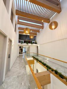 a large room with a glass counter in a building at Hotel Casa costa in Mollendo +14 photos