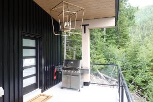 Balkón nebo terasa v ubytování Black Diamond Cabin - Sasquatch Mountain Resort