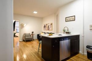 a kitchen with a sink and a counter top at 109-1 Huge 3BR Best Value Amazing NYC Apt in New York