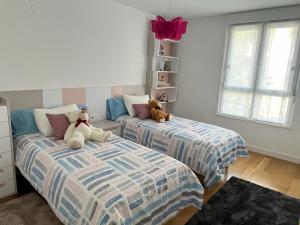 Posteľ alebo postele v izbe v ubytovaní Apartamento moderno y acogedor ideal familias
