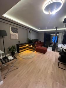 Posezení v ubytování Prive Living Suite
