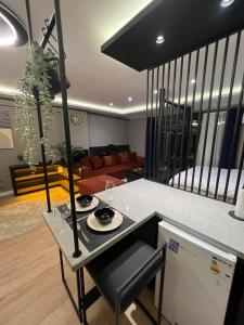 Posezení v ubytování Prive Living Suite