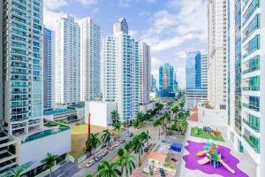 an aerial view of a city with tall buildings at Awesome 2BR with balcony in Costa del Este in Panama City