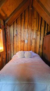 Ein Bett oder Betten in einem Zimmer der Unterkunft Cabaña en Valdivia